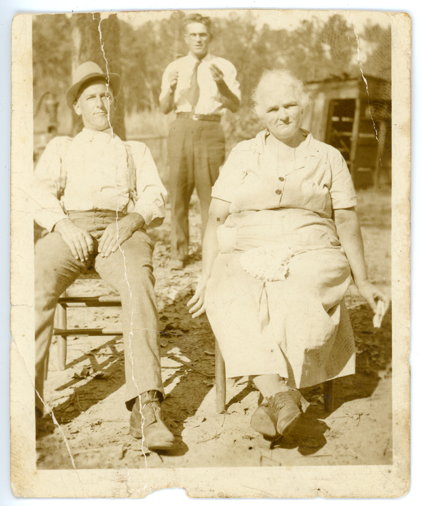Stephen E. Morris and Augusta Morris (both seated) with Jake Morris in rear.
